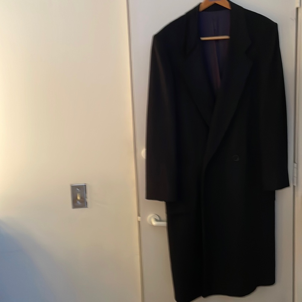 Men’s black cashmere dress coat by Perry Ellis. Double breasted 2 button close.
